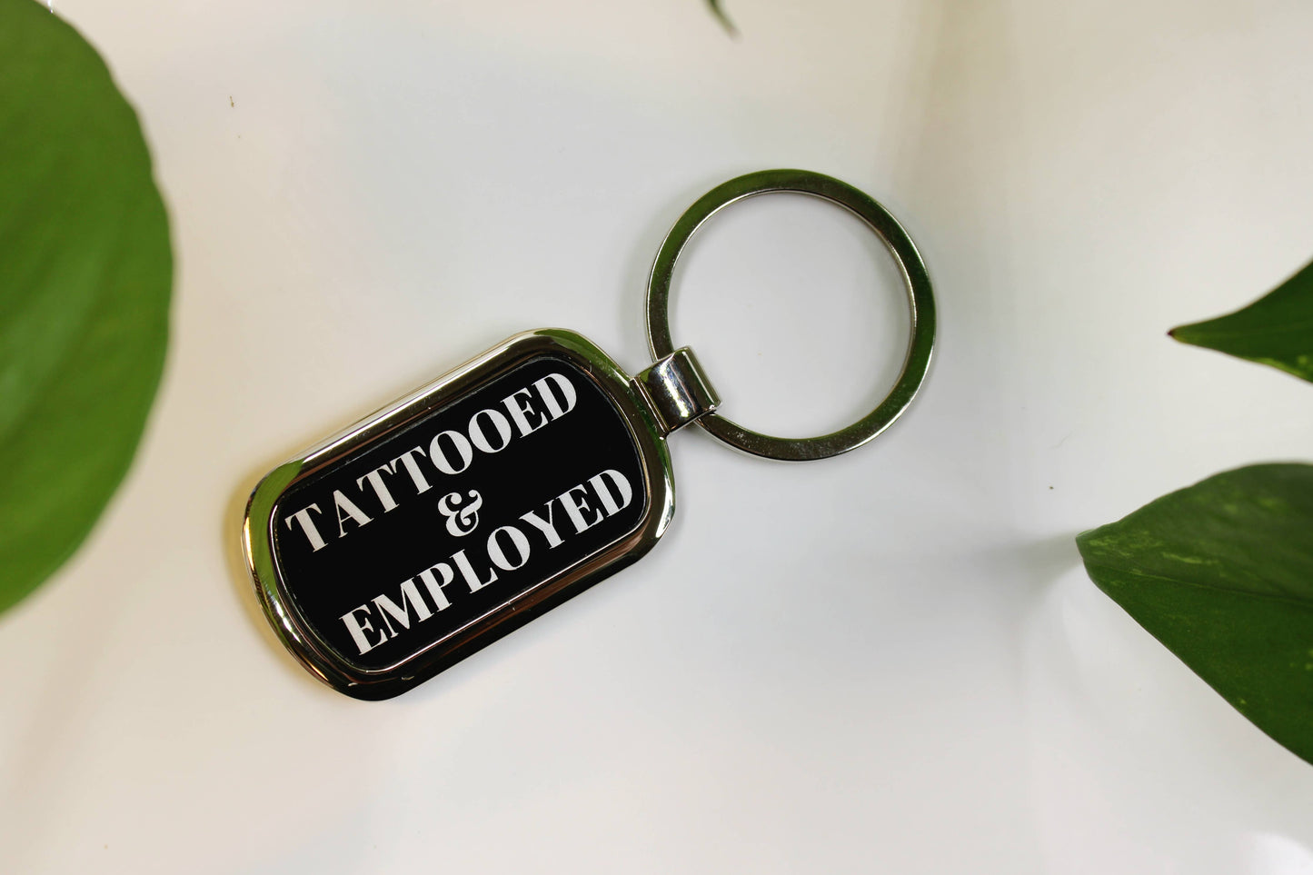 Three Witches Tea Shop - Tattooed + Employed Engraved Metal Keychain